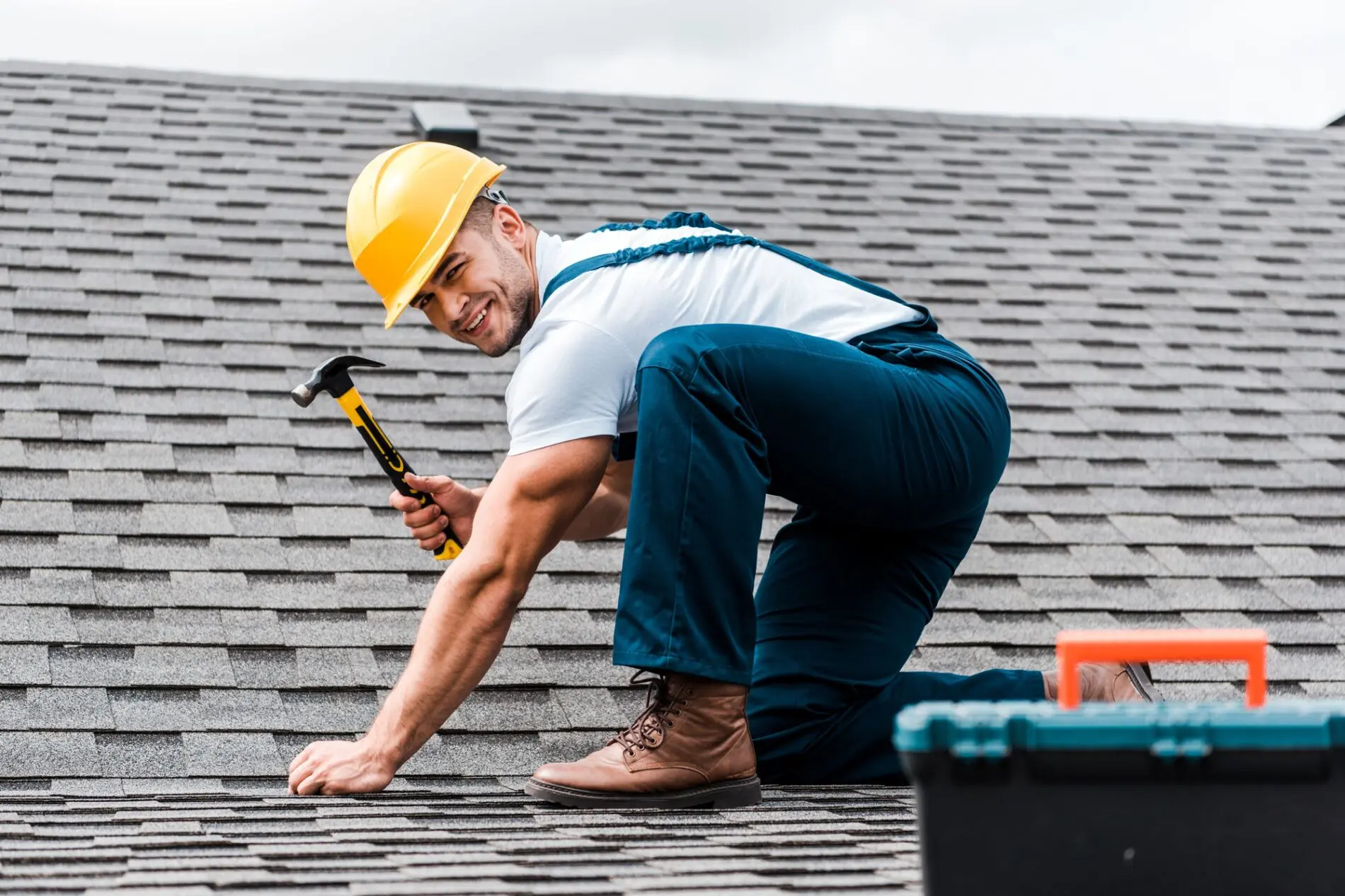 Roofer repairing a roof leak in Sheffield